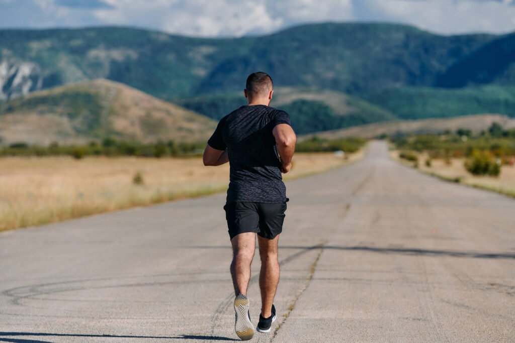 Athletic Man Jogging In The Sun Preparing His Bod 2024 06 12 02 21 41 Utc 1024x683